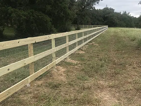 wooden perimeter fence by cooper fence