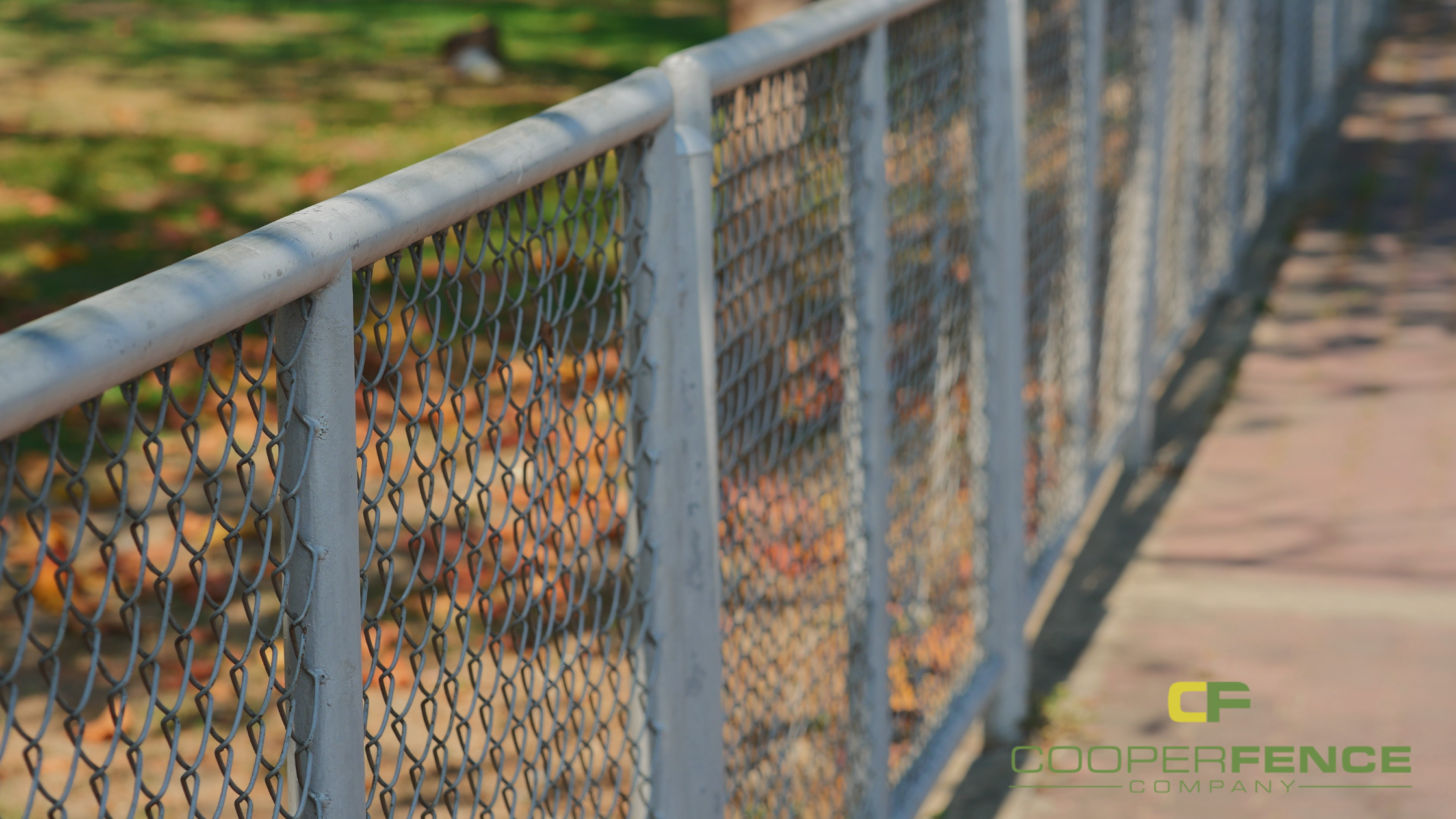 chain link fence showing signs of wear and leaning posts
