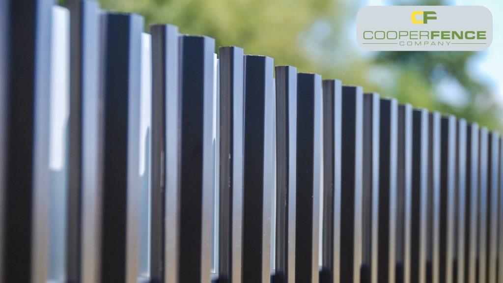 A secure, commercial-grade galvanized chain link fence installed at a business facility in Baldwin County.